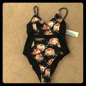 One piece NWT large floral with black swimsuit.